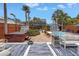 Inviting backyard with a pool, hot tub, lounge chairs, a cozy seating area, and lush tropical landscaping at 145 19Th Se Ave, St Petersburg, FL 33705