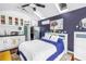 Cozy bedroom features skylights, kitchenette, modern decor, and comfortable sleeping area at 145 19Th Se Ave, St Petersburg, FL 33705