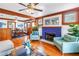Comfortable living room with wood trim, hardwood floors, and a fireplace at 145 19Th Se Ave, St Petersburg, FL 33705
