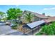 The auditorium features a covered entrance, lush landscaping, and ample parking at 1496 Queen Anne Dr, Palm Harbor, FL 34684