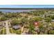 Aerial view of neighborhood with a home close to a lake at 1726 25Th S Ave, St Petersburg, FL 33712