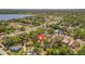 Overhead neighborhood view of home close to a lake with a red pin at 1726 25Th S Ave, St Petersburg, FL 33712