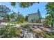 Backyard features a storage shed and grassy area, providing a private outdoor retreat at 1726 25Th S Ave, St Petersburg, FL 33712