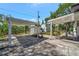 This backyard features a covered patio, carport, and storage shed, perfect for outdoor living and storage at 1726 25Th S Ave, St Petersburg, FL 33712