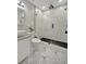 Modern bathroom featuring a sleek glass shower and modern fixtures for a luxurious experience at 1726 25Th S Ave, St Petersburg, FL 33712