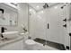 Modern bathroom featuring a sleek glass shower and modern fixtures for a luxurious experience at 1726 25Th S Ave, St Petersburg, FL 33712