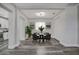 Inviting dining room features a modern chandelier, neutral paint and ample space for entertaining at 1726 25Th S Ave, St Petersburg, FL 33712