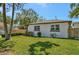 Well-maintained home with healthy green lawn at 1726 25Th S Ave, St Petersburg, FL 33712