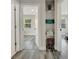 Open hallway that showcases the interior doors and access to adjacent rooms and interior decor at 1726 25Th S Ave, St Petersburg, FL 33712