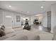 Bright open-concept living space flowing into a dining area and showcasing modern finishes throughout at 1726 25Th S Ave, St Petersburg, FL 33712