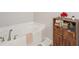 Bathroom cabinet offers open storage with a combination of drawers and shelving at 20224 Natures Spirit Dr, Tampa, FL 33647