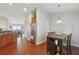 Eat in kitchen features stainless steel appliances and dark cabinetry with access to dining room at 20224 Natures Spirit Dr, Tampa, FL 33647