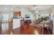 Bright and airy living area with hardwood floors, ample seating, and an open view to the kitchen at 20224 Natures Spirit Dr, Tampa, FL 33647