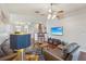 Inviting living room featuring hardwood floors, comfortable seating, and an open layout at 20224 Natures Spirit Dr, Tampa, FL 33647