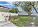 Fenced backyard with room for entertaining, planting and playing at 2107 E 93Rd Ave, Tampa, FL 33612