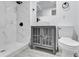 Modern bathroom with sleek vessel sink, toilet, and tiled shower at 2107 E 93Rd Ave, Tampa, FL 33612