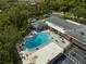 The community pool has seating and easy access, along with nearby shuffleboard courts at 2127 Scotland Dr, Clearwater, FL 33763