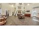 Well-appointed clubhouse with a kitchenette, dining space, and access to outdoor amenities at 2220 Chianti Pl # 8-0817, Palm Harbor, FL 34683