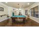 Game room includes a pool table and comfortable seating at 2220 Chianti Pl # 8-0817, Palm Harbor, FL 34683