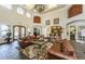 Elegant living space with decorative details, comfortable seating, and convenient access to the kitchen area at 2220 Chianti Pl # 8-0817, Palm Harbor, FL 34683