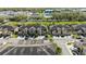 Aerial view showcases the property's location and neighborhood layout, near the pond, and amenities at 2221 Broadway View Ave, Brandon, FL 33510