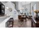 Open-concept dining area featuring a modern chandelier at 2221 Broadway View Ave, Brandon, FL 33510