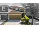 Charming two-story home with a two car garage, a well maintained lawn, and manicured landscaping at 2221 Broadway View Ave, Brandon, FL 33510