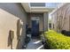 Welcoming front entrance with a decorative door and tidy landscaping at 2221 Broadway View Ave, Brandon, FL 33510