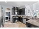 Modern kitchen with granite countertops and stainless steel appliances at 2221 Broadway View Ave, Brandon, FL 33510