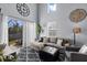 Cozy living room filled with natural light and decorated with stylish furniture at 2221 Broadway View Ave, Brandon, FL 33510