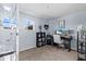 Comfortable office space features a large window for natural light and ample desk space with storage at 2221 Broadway View Ave, Brandon, FL 33510