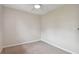 Picture of a simple bedroom with neutral walls, carpet, and minimal features at 2934 Lichen Ln # A, Clearwater, FL 33760