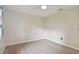Neutral-toned bedroom with a ceiling fan, carpeted floor, and a window at 2934 Lichen Ln # A, Clearwater, FL 33760