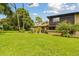 Exterior view of home with well maintained lawn at 2934 Lichen Ln # A, Clearwater, FL 33760