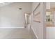 Bright living room with neutral walls, tile flooring, and an open layout, perfect for modern living at 2934 Lichen Ln # A, Clearwater, FL 33760