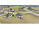 Aerial view of the community highlighting well-maintained lawns and neighborhood layout at 30475 Satinleaf Run, Brooksville, FL 34602