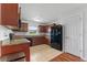 Functional kitchen features modern appliances, tile flooring, ample cabinet space, and granite countertops at 30475 Satinleaf Run, Brooksville, FL 34602