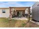 Enjoy outdoor living with this covered patio, ideal for entertaining and relaxing at 30475 Satinleaf Run, Brooksville, FL 34602