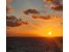 Breathtaking ocean sunset view, featuring vibrant colors and dramatic clouds at 3543 Rockaway Dr, Holiday, FL 34691