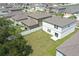 Aerial view of the backyard, showcasing the home's layout and integration with the surrounding neighborhood at 35646 Eastbrook Ave, Zephyrhills, FL 33541