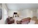Inviting living room is perfect for relaxing or entertaining guests at 35646 Eastbrook Ave, Zephyrhills, FL 33541