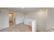 Upstairs loft area with neutral carpet and bright, airy feel at 35646 Eastbrook Ave, Zephyrhills, FL 33541