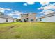 Large grassy backyard with plenty of room for activities at 36727 Spanish Rose Dr, Dade City, FL 33525