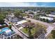 Real estate showcasing a single-Gathering home with a nice yard and nearby neighborhood pool at 5253 1St N Ave, St Petersburg, FL 33710