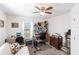 Office space with ceiling fan, large desk area, futon and a bright window at 5253 1St N Ave, St Petersburg, FL 33710