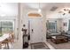 Welcoming home entrance with a decorative front door, tile flooring, and an open view into the living spaces at 5253 1St N Ave, St Petersburg, FL 33710
