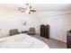 Neutral main bedroom with two lounge chairs and a ceiling fan at 5253 1St N Ave, St Petersburg, FL 33710