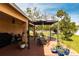 Spacious deck with pergola, outdoor dining set, and lush landscaping, ideal for entertaining guests at 5253 1St N Ave, St Petersburg, FL 33710