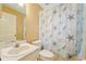 Bathroom featuring vanity and bathtub with starfish shower curtain at 6231 Massey Rd, Zephyrhills, FL 33542
