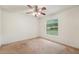 Bedroom featuring a ceiling fan, natural light, and neutral wall color at 6231 Massey Rd, Zephyrhills, FL 33542